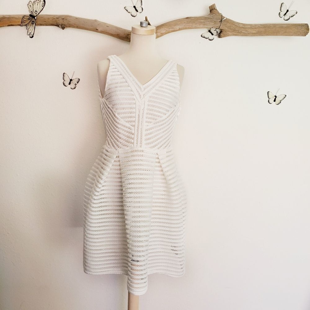 Beulah modern structure semi sheer mini dress